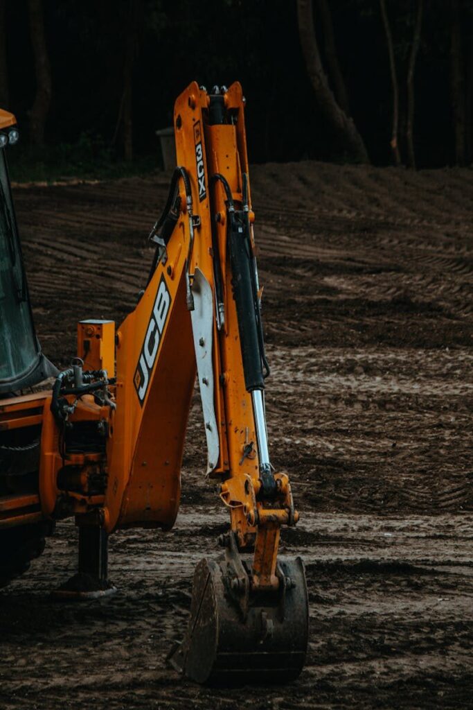 A powerful excavator digging on a construction site, perfect for industrial and construction themes.